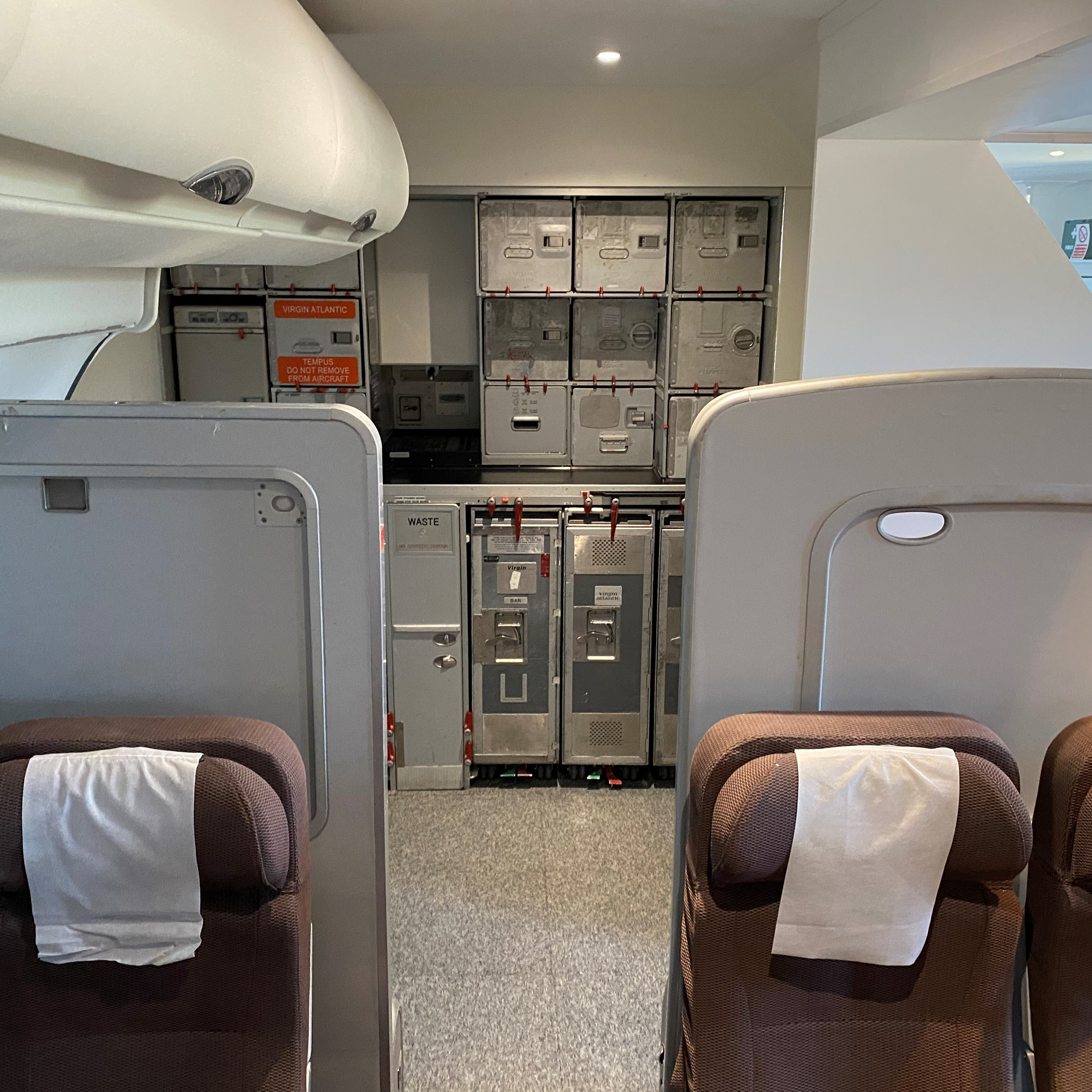 Galley area of Airplane Cabin mock-up, including carts, boxes, and ovens, at the  Training Facilities.